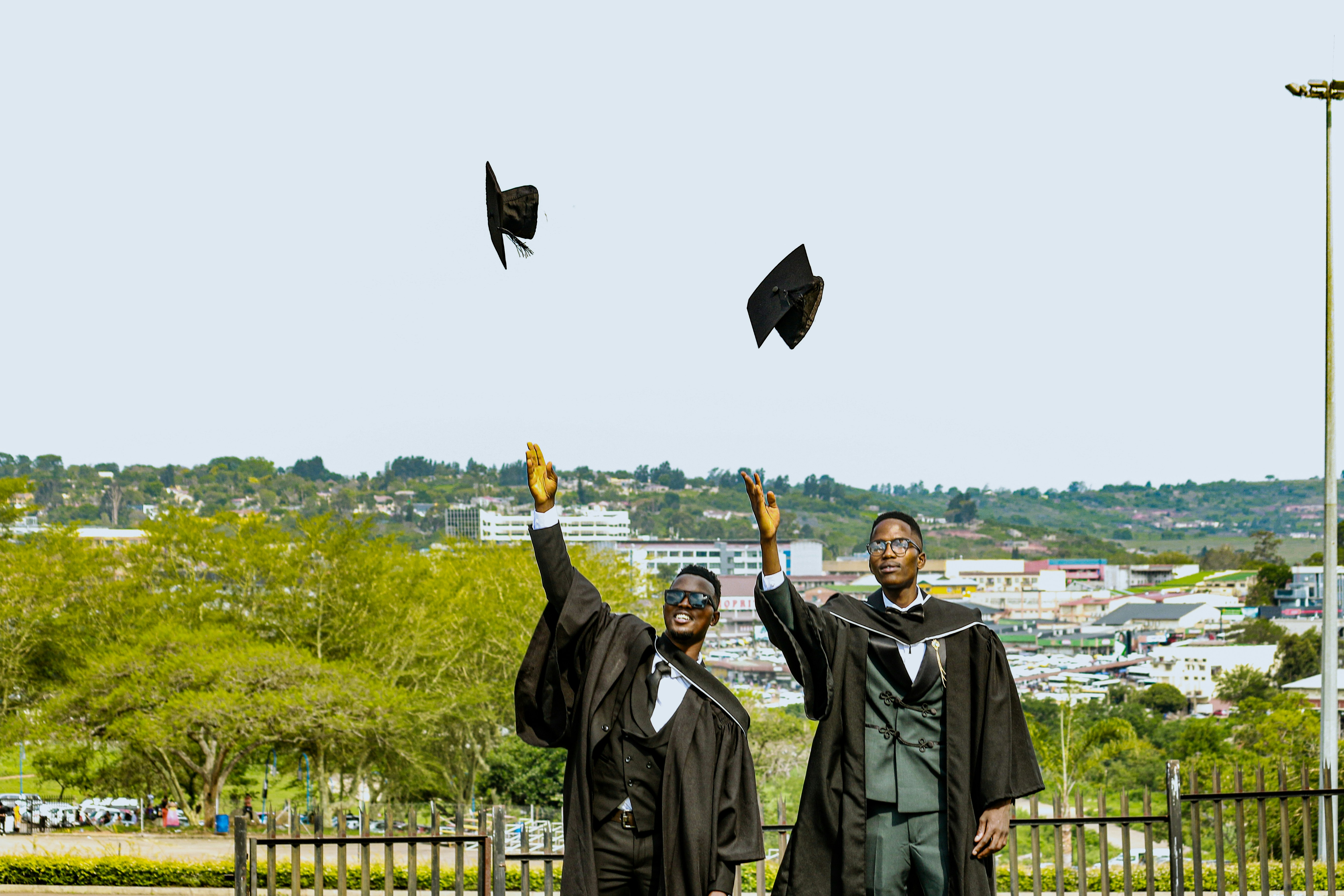 Recent graduates celebrating achievement and career start