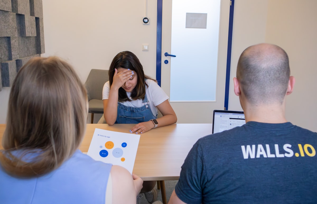 Professionals in discussion around office table