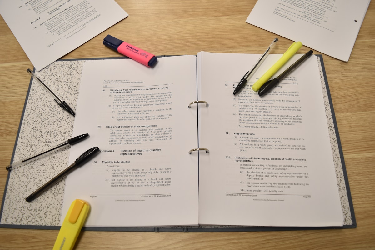 Papers and pens laid out for document editing and review